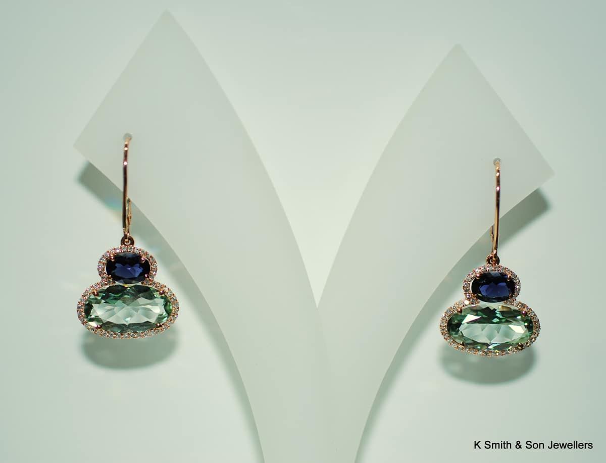 Pair of Earrings on White Stands, Featuring Blue and Green Stones — K. Smith & Son Jewellers In Caloundra, QLD