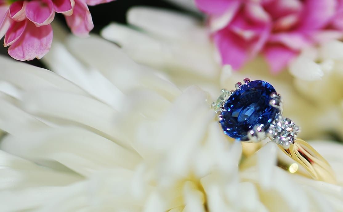 A Man is Working on a Piece of Metal With a Drill — K. Smith & Son Jewellers In Caloundra, QLD
