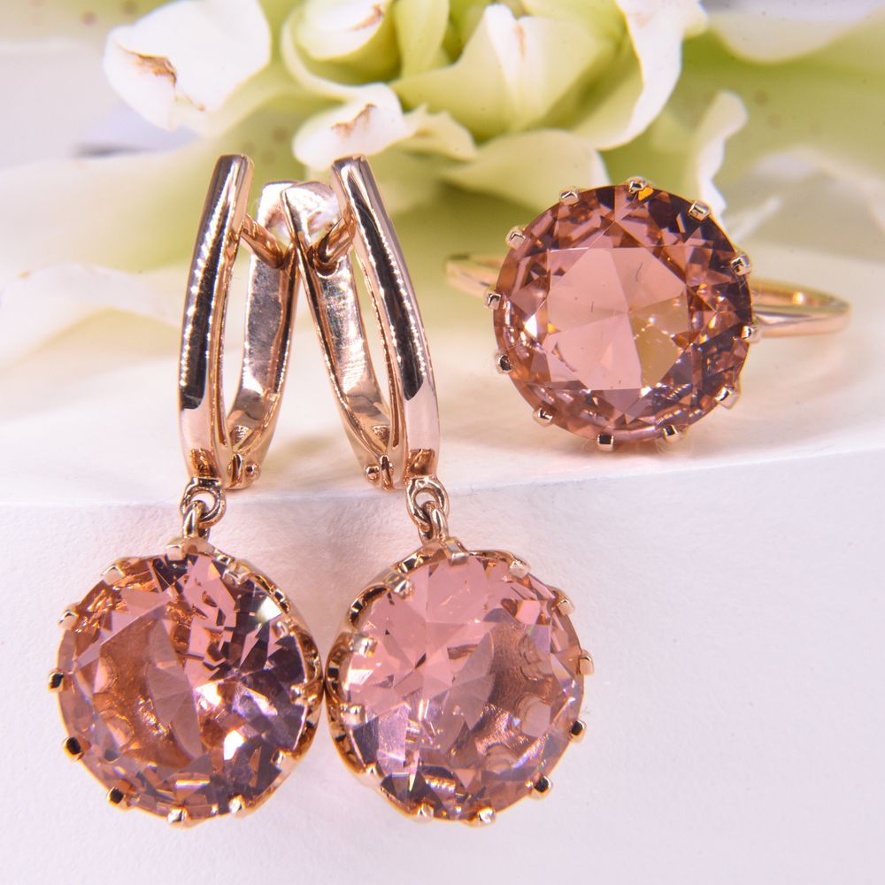 A Pair of Earrings and a Ring With Pink Stones — K. Smith & Son Jewellers In Brisbane, QLD
