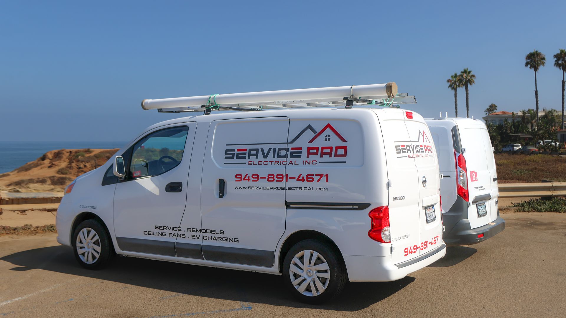 Two service pro vans are parked next to each other