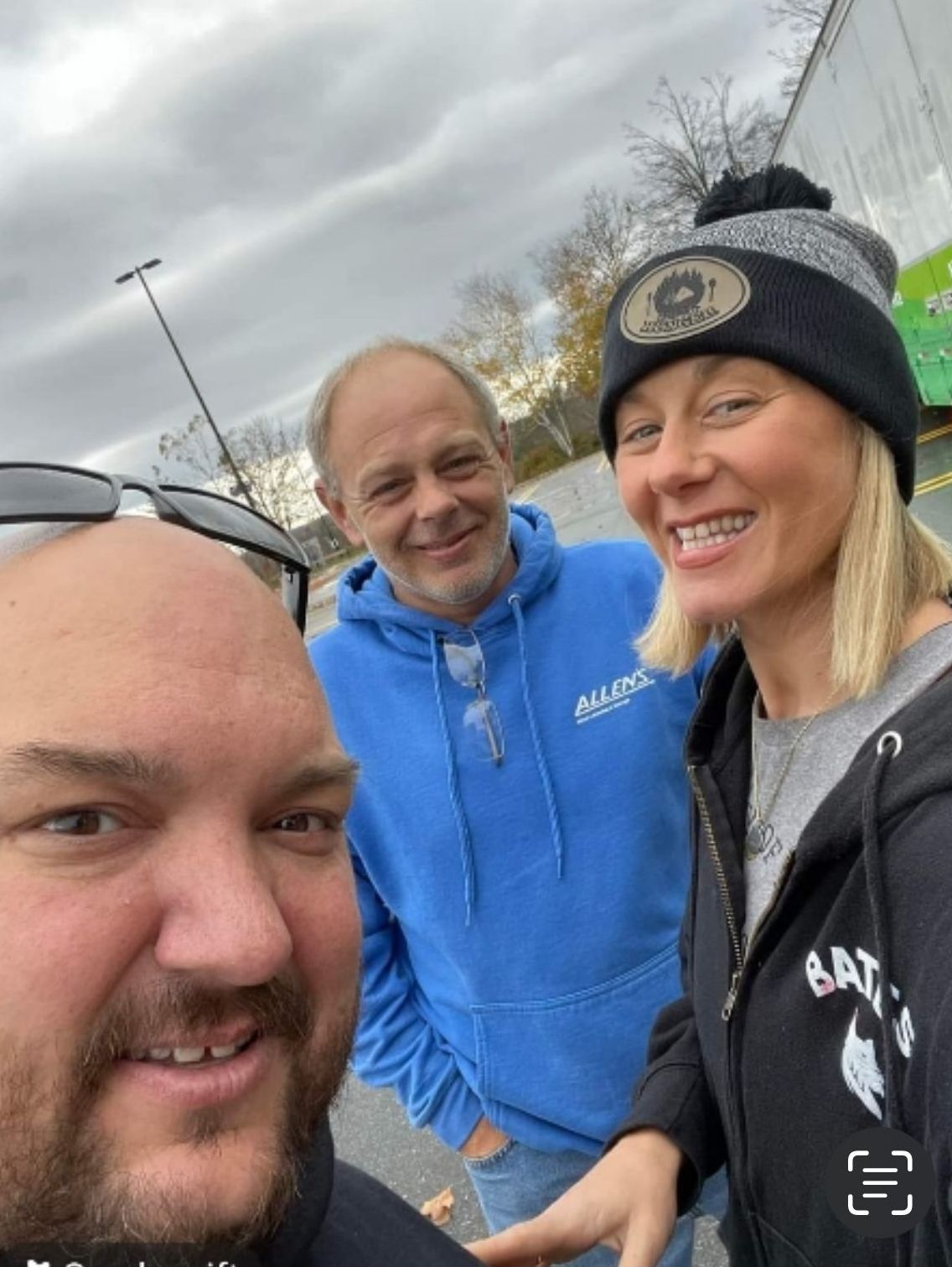 A man and a woman are posing for a picture together