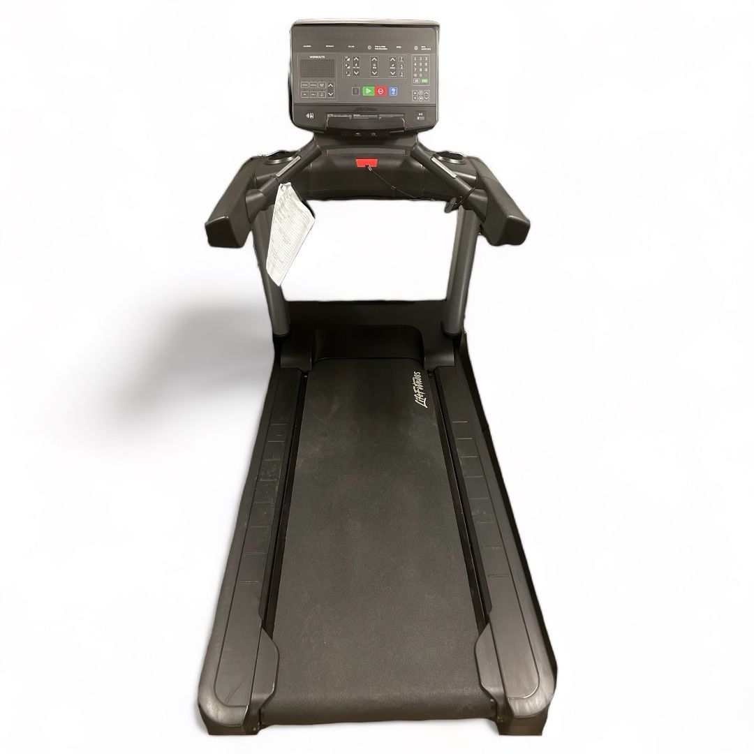 Black treadmill with digital display, armrests, on a white background.