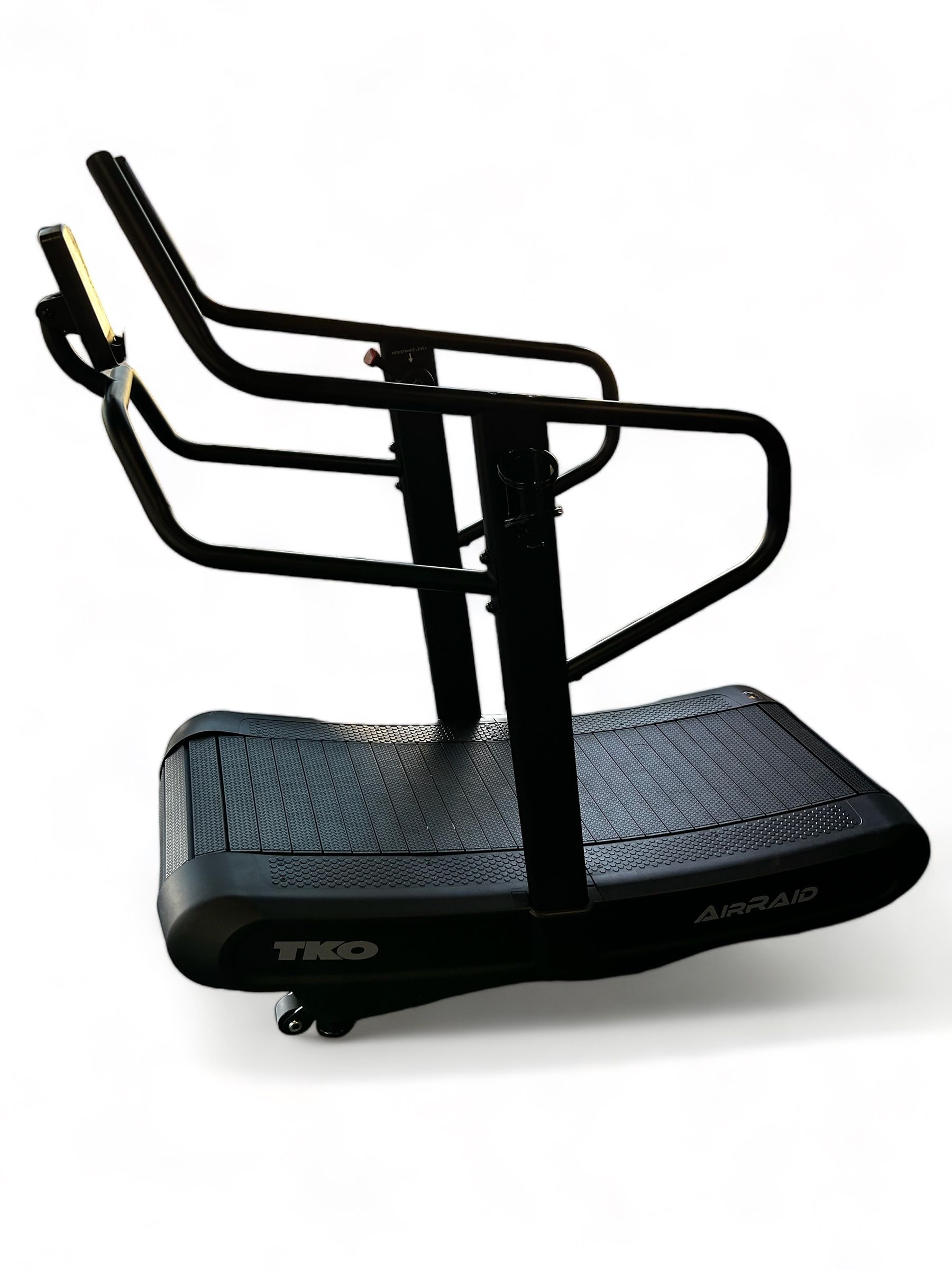 Black curved treadmill with handrails.