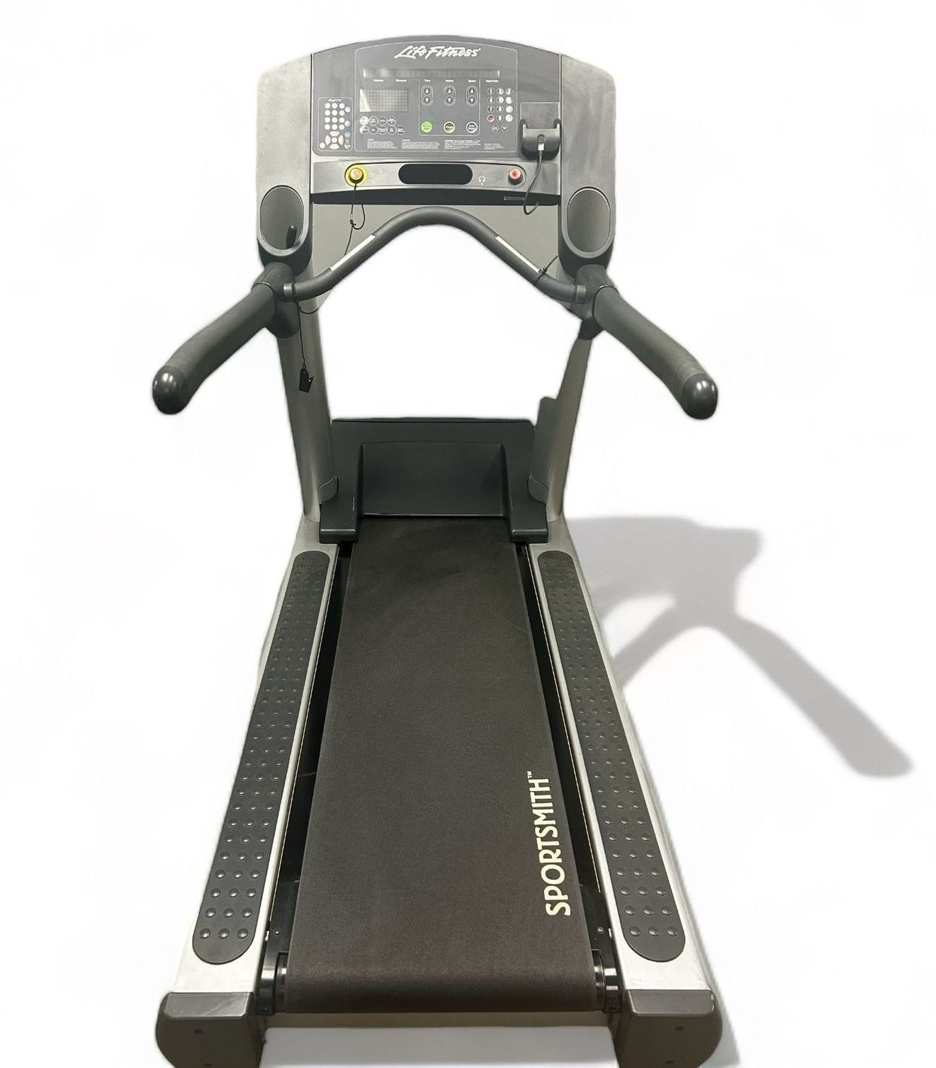 Treadmill with gray frame and black belt, overhead view. 