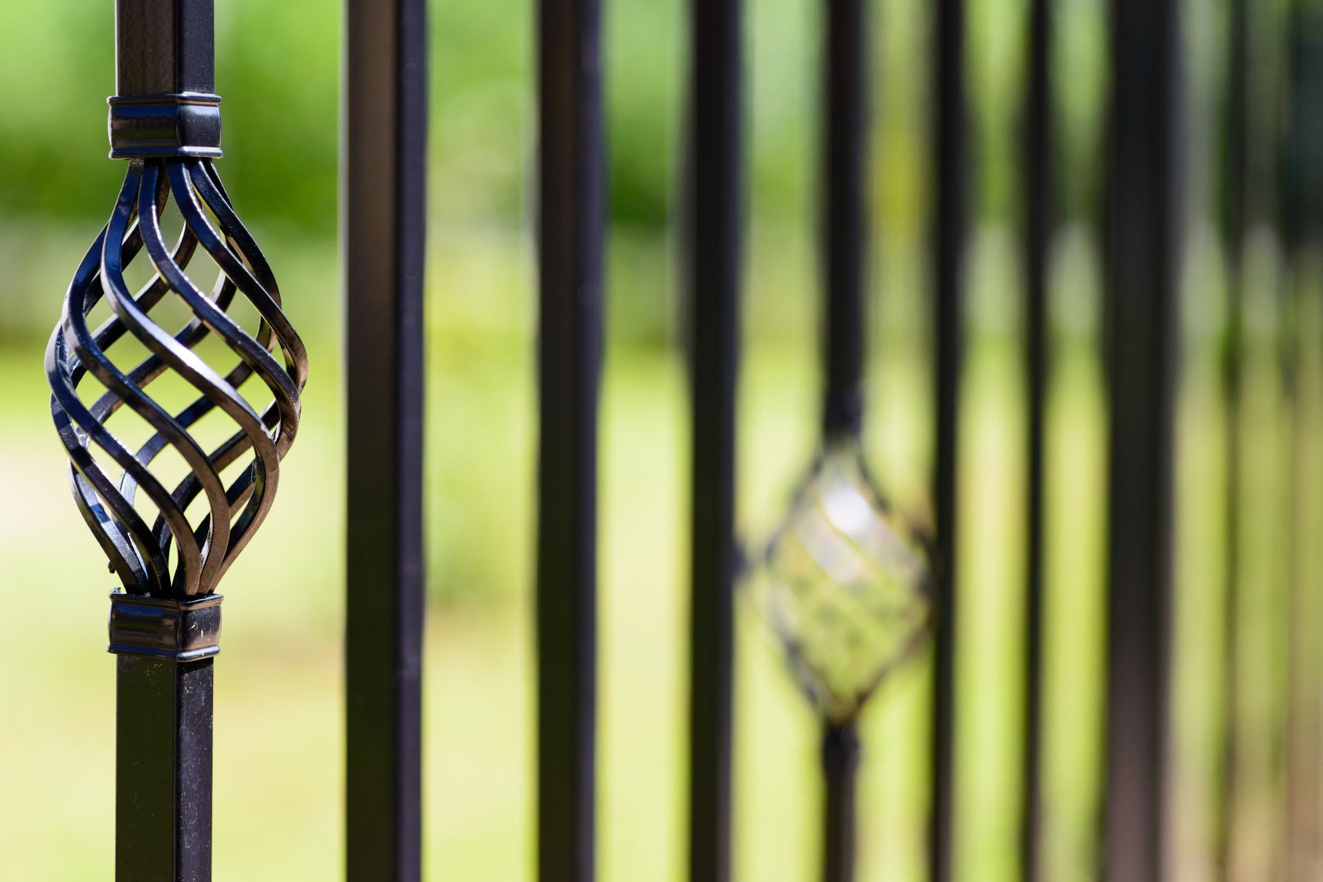Close-up of angular iron railings at a residential property