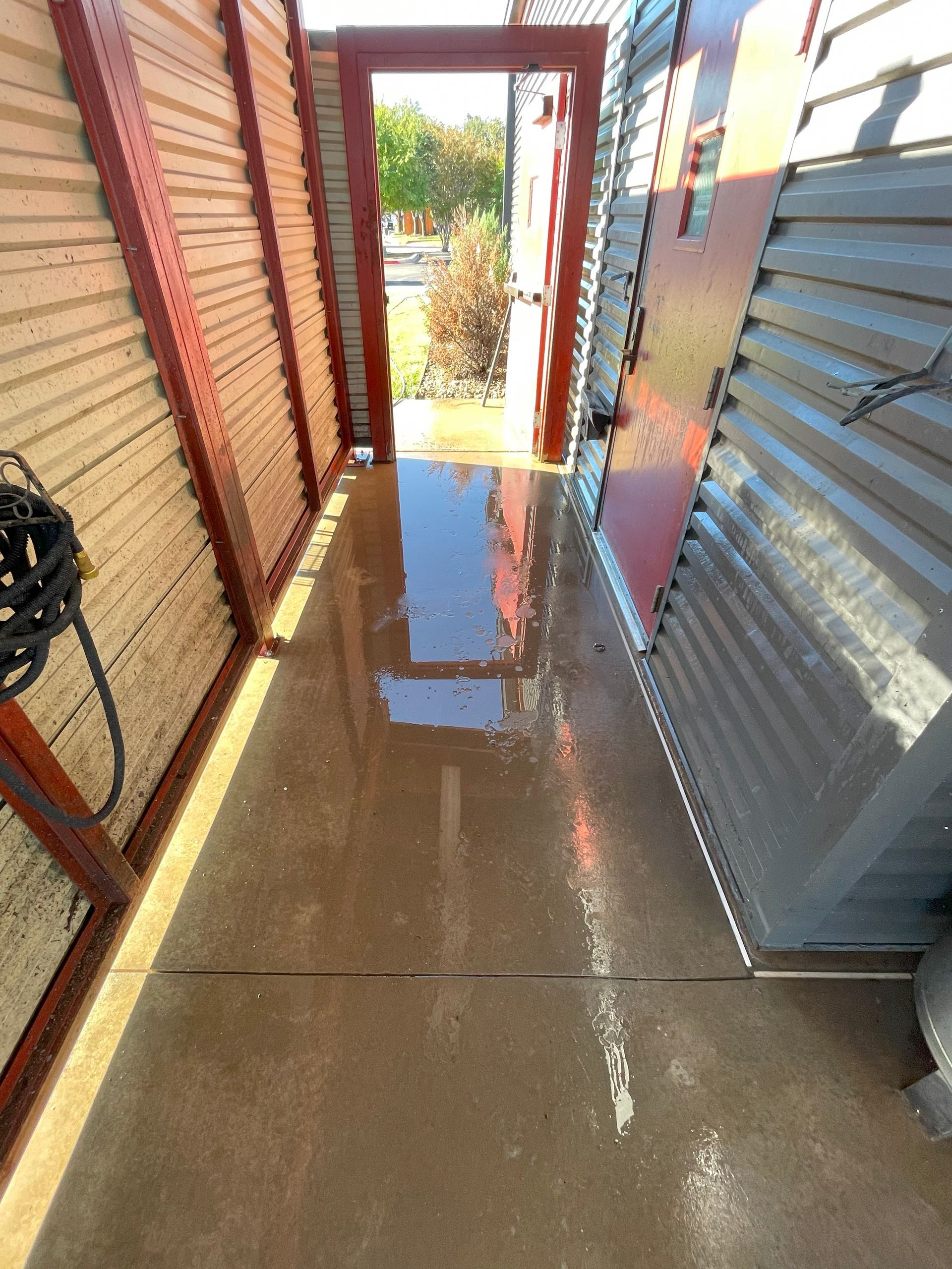 image of house concrete porch/garage after washing