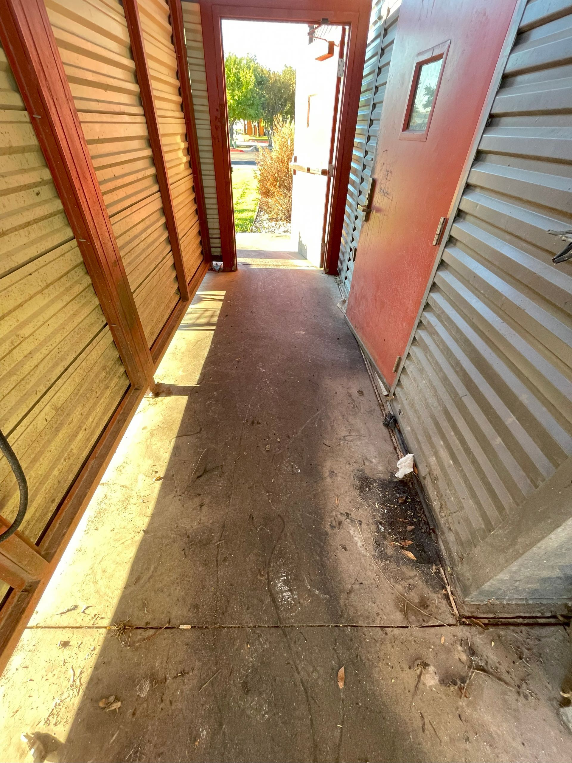 image of house concrete porch/garage before washing