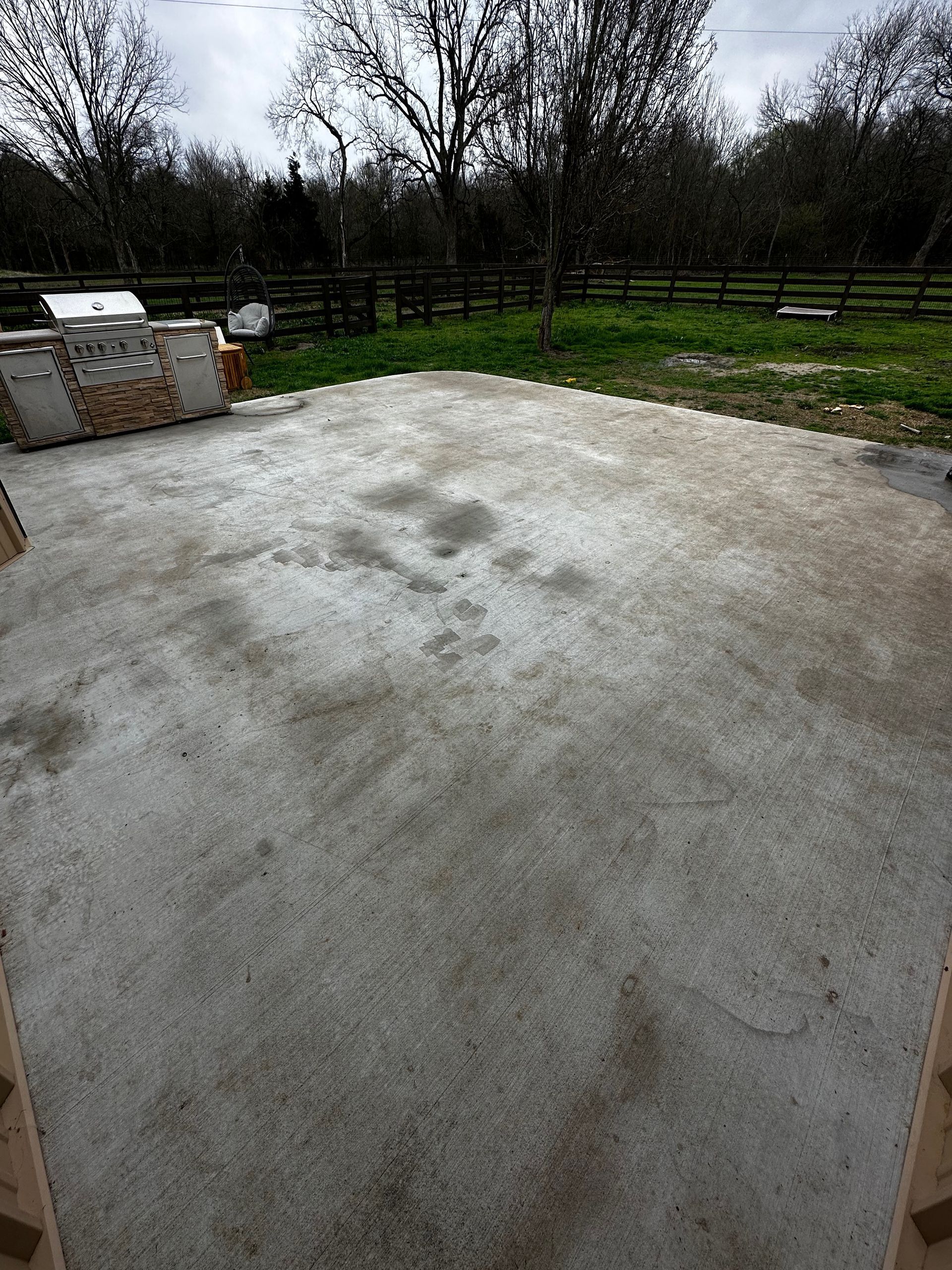 house concrete garage with stains