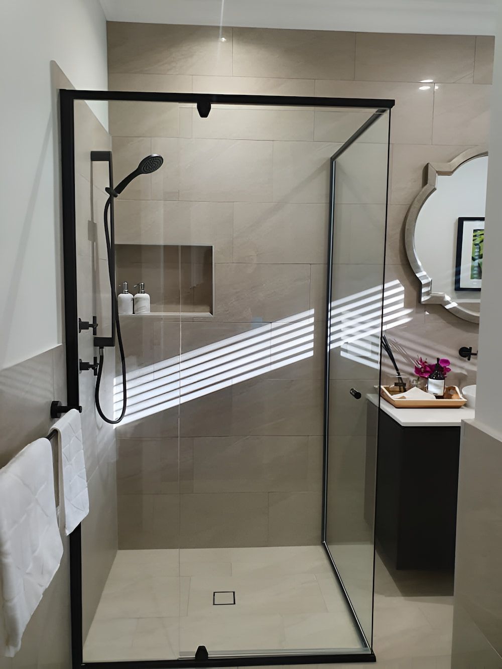 A Bathroom With A Walk In Shower And A Sink — Mobile Shower Door Doctor In Buderim, QLD