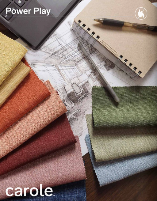 Fabric swatches in various colors on top of a blueprint and notepad with pen.