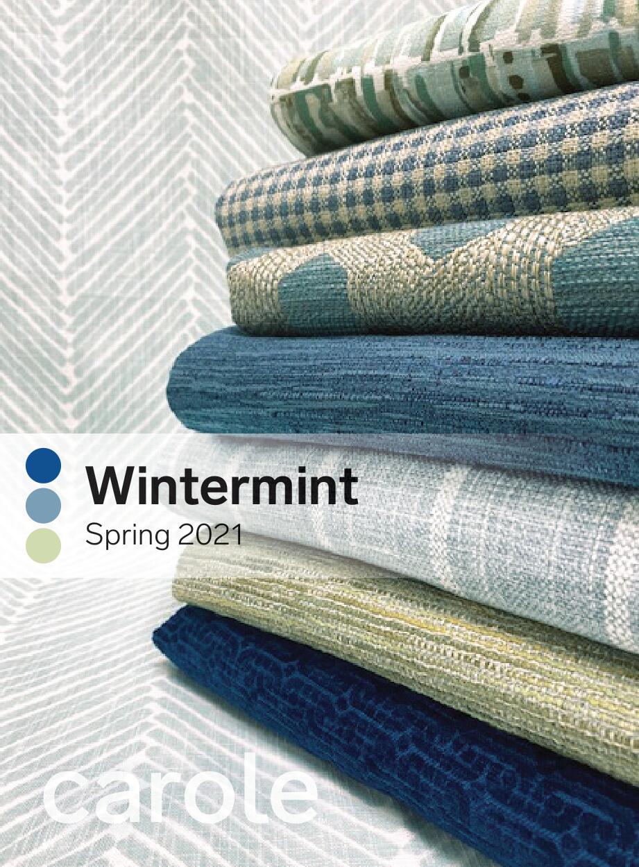 Stacks of patterned fabric in cool blue and green tones, 