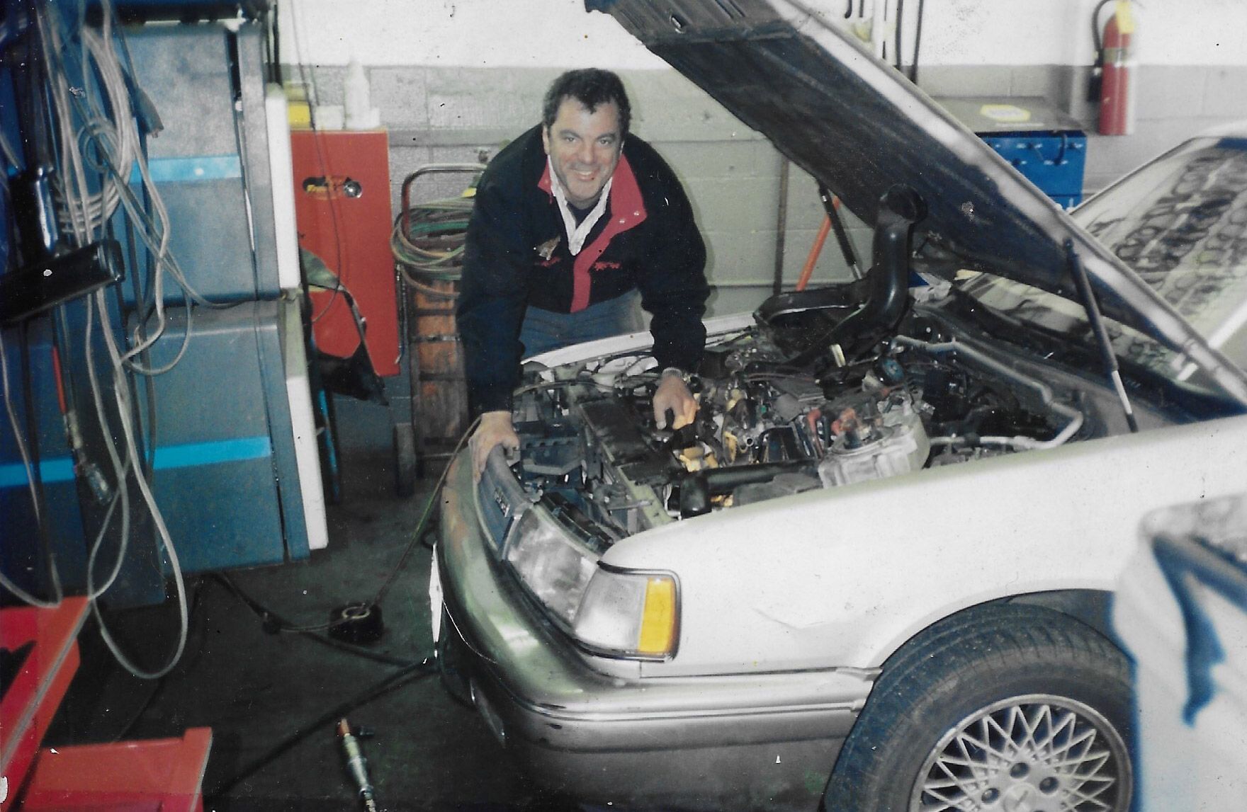 Mechanic Looking at Engine | Aspen Hill Exxon