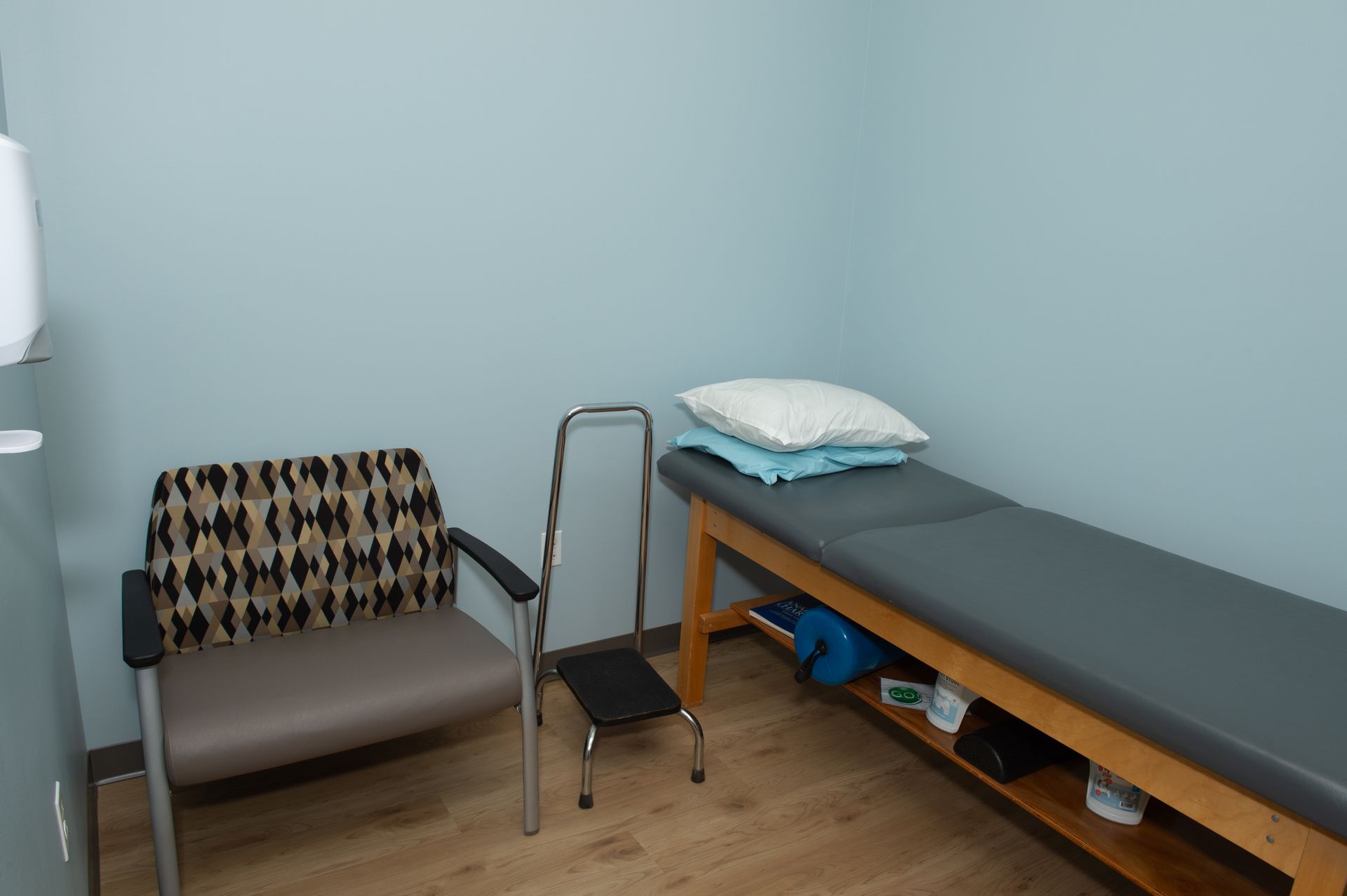 There is a couch and a table in the room.