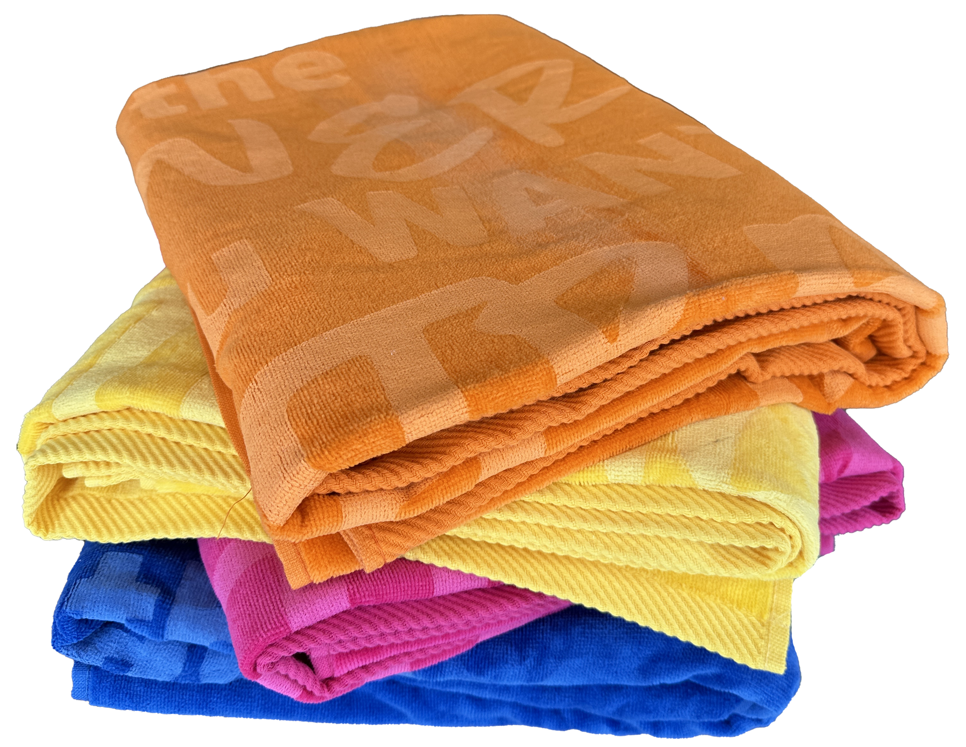 A stack of colorful towels including one that says 