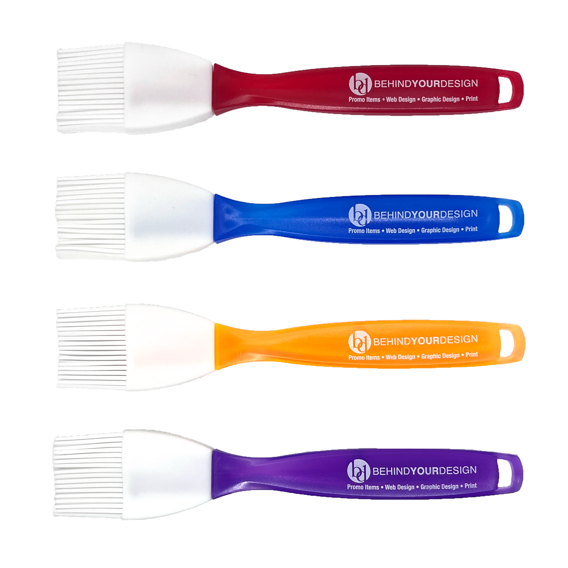 Four different colored brushes are lined up on a white background