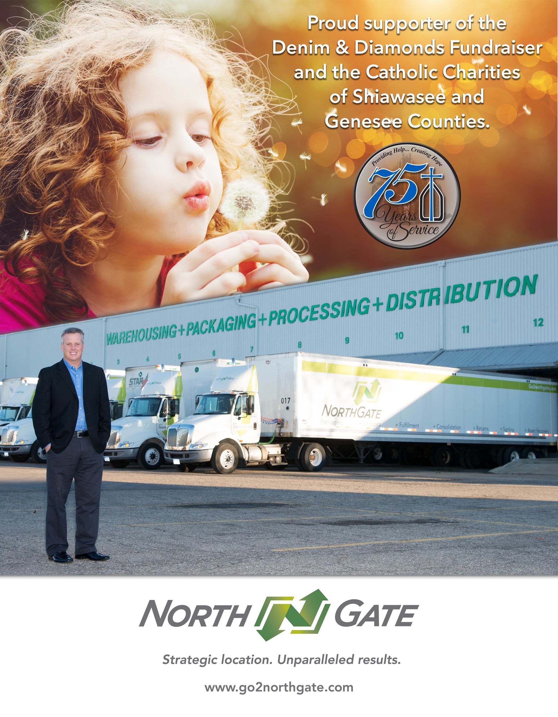 A girl blowing a dandelion in front of a row of north gate trucks