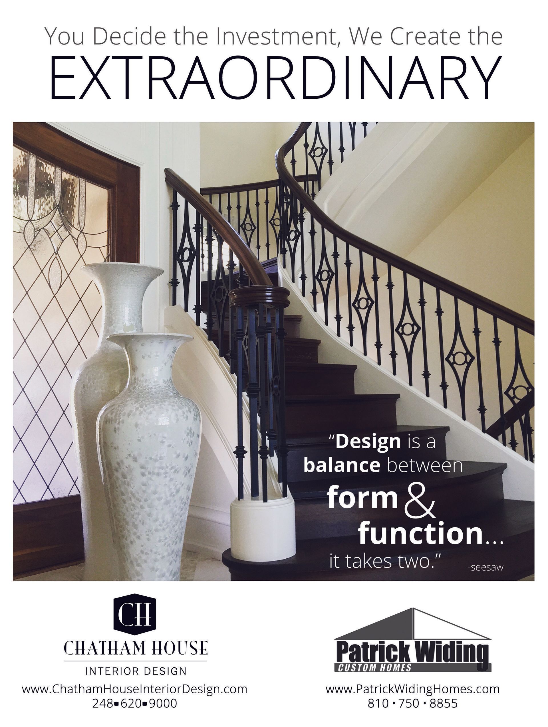 A staircase with a wrought iron railing and two vases in front of it.