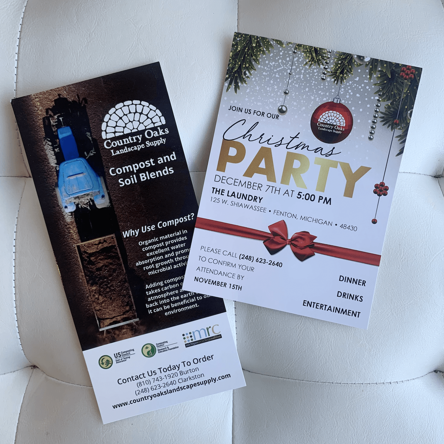 A christmas party flyer is on a white couch