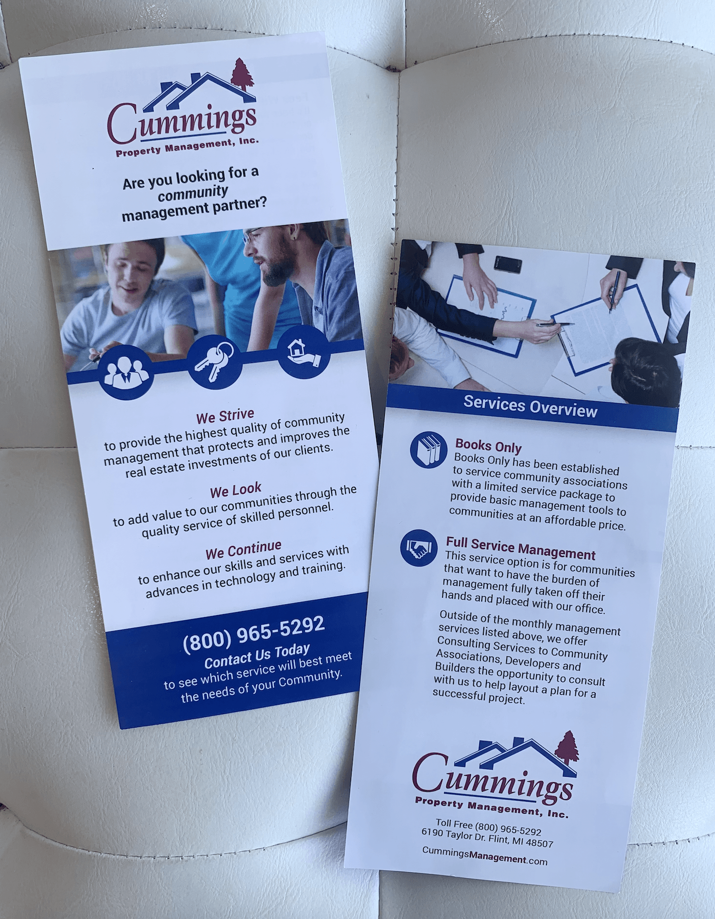 Two cummings brochures are sitting on a white couch