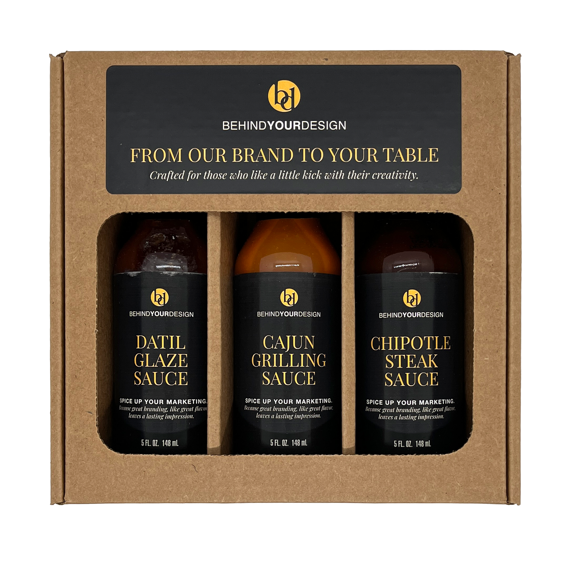 Three bottles of sauce in a box that says from our brand to your table