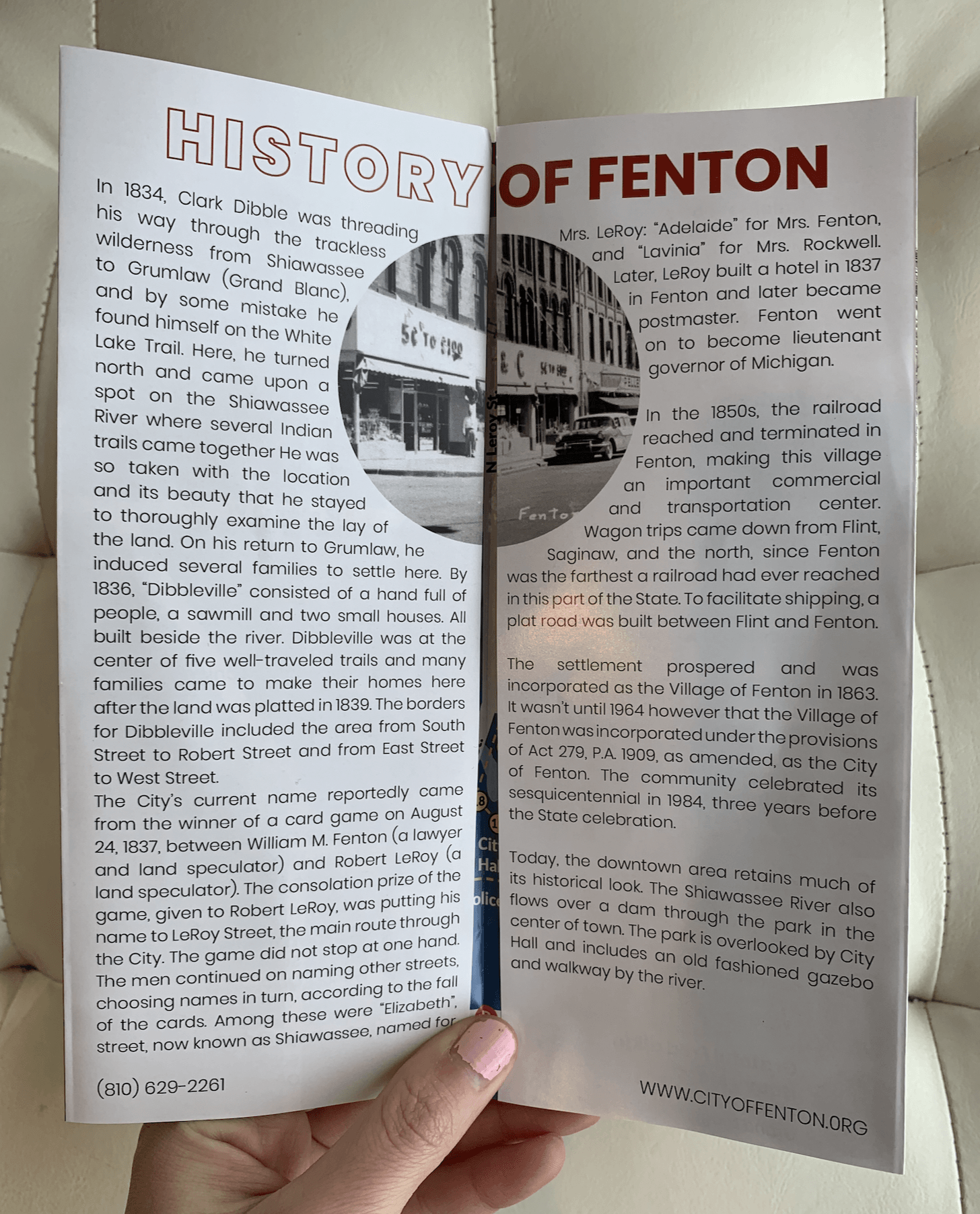 A person is holding a pamphlet about the history of fenton.