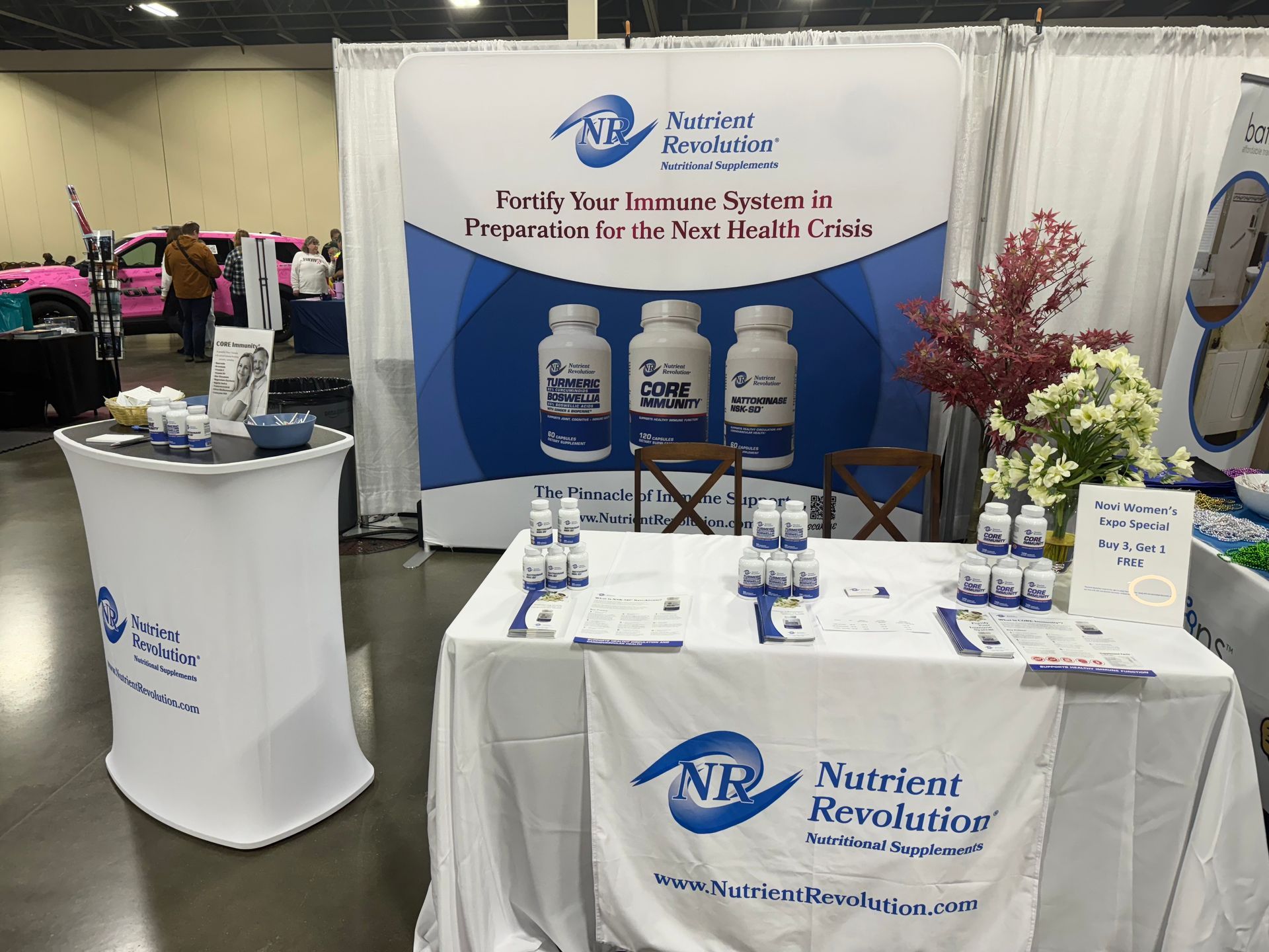 A table with a sign on it that says nutrient revolution on it.