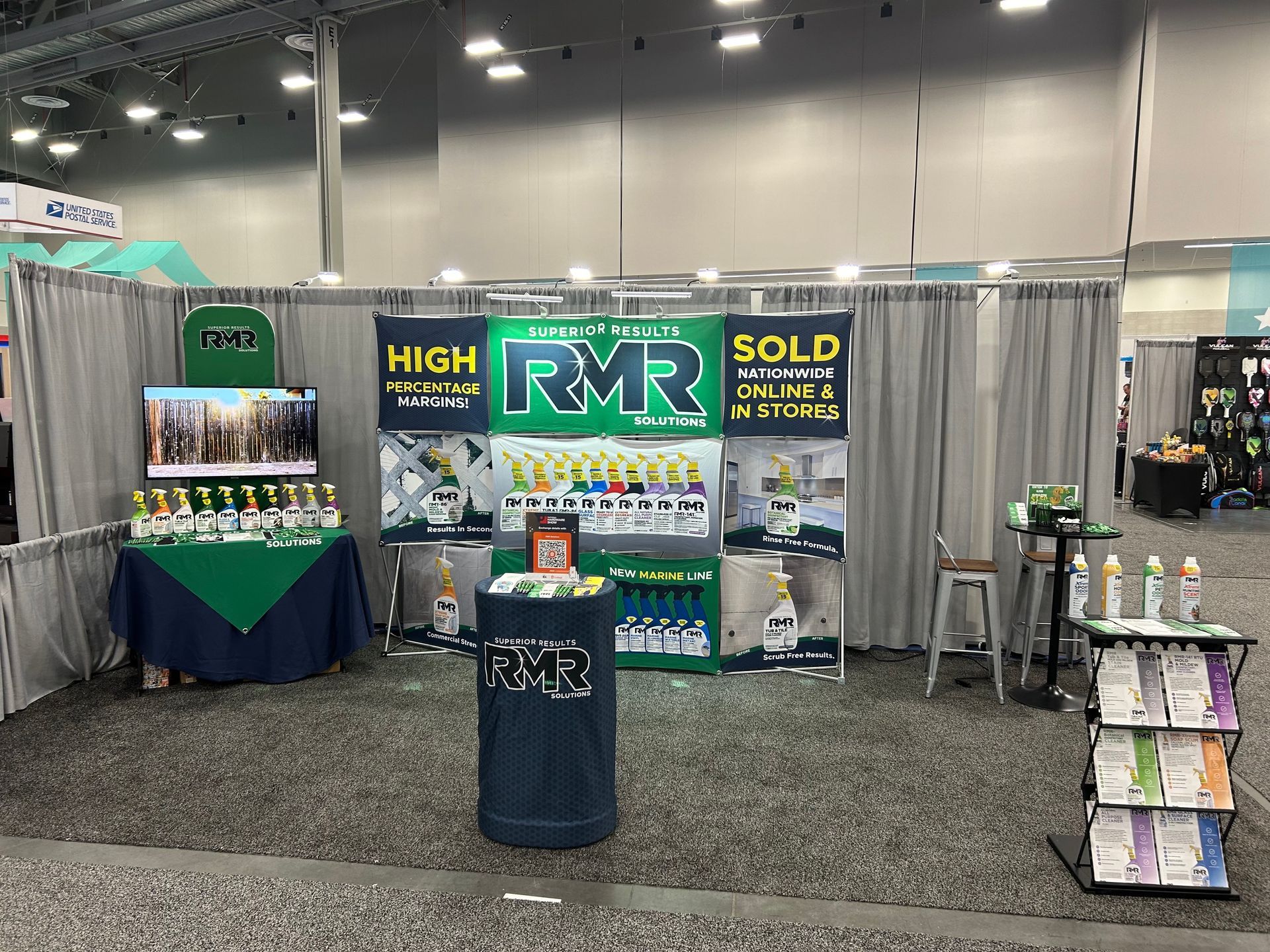 A booth at a convention with a sign that says `` high rvr sold ''.