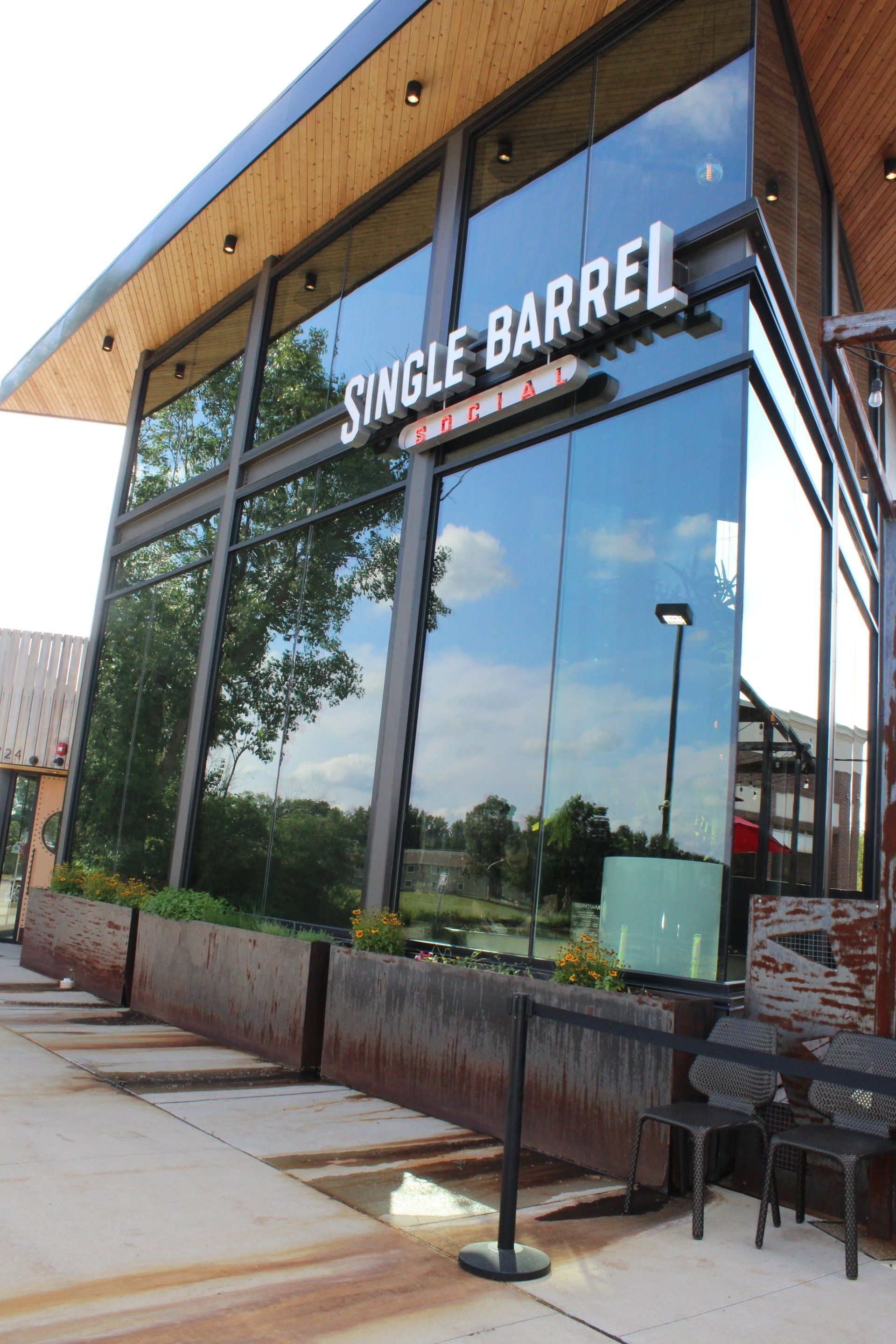 A building with a sign that says ' sansle barrel ' on it