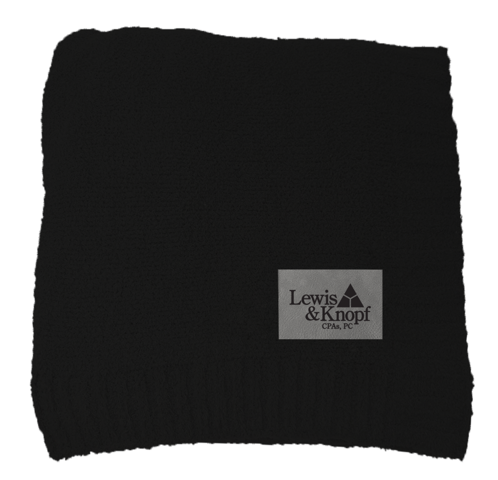 A black blanket with a label that says lewis & knopf