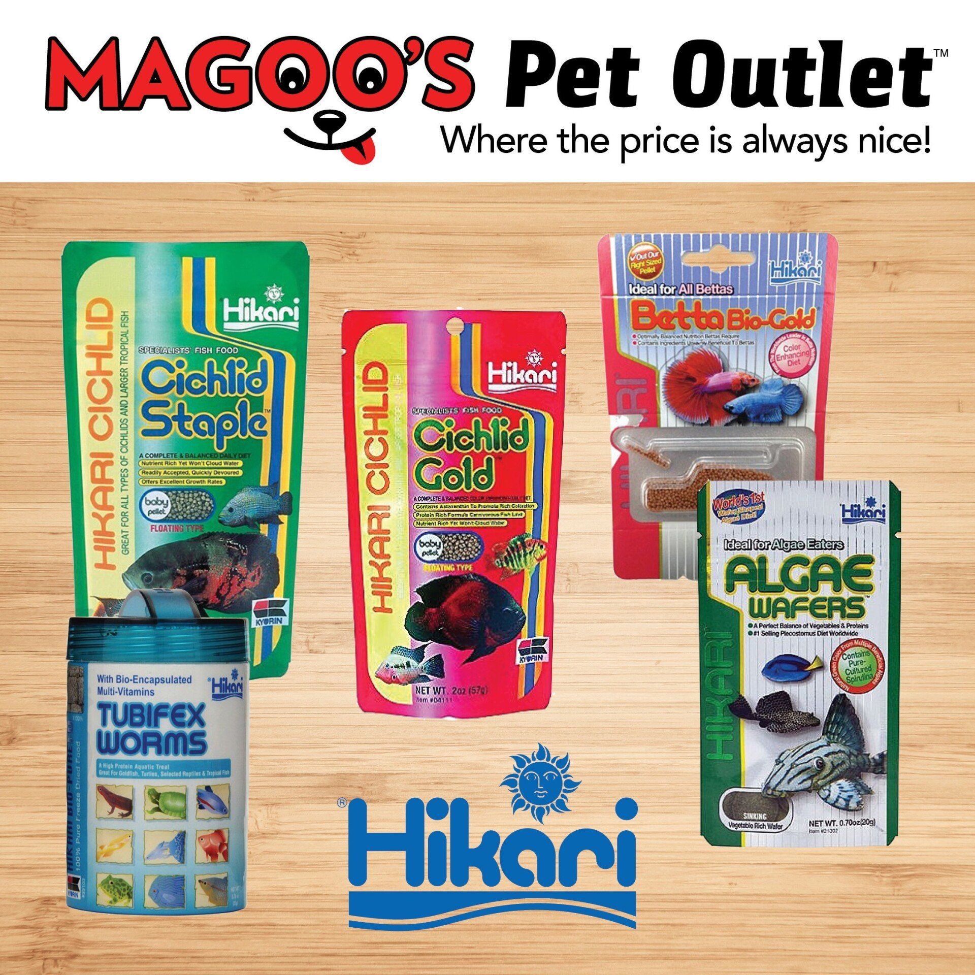 A variety of fish food is sitting on a wooden table.