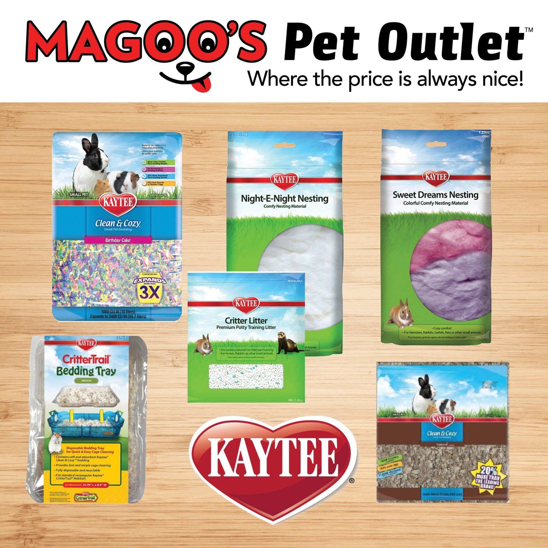 A variety of kaytee products are displayed on a wooden table.