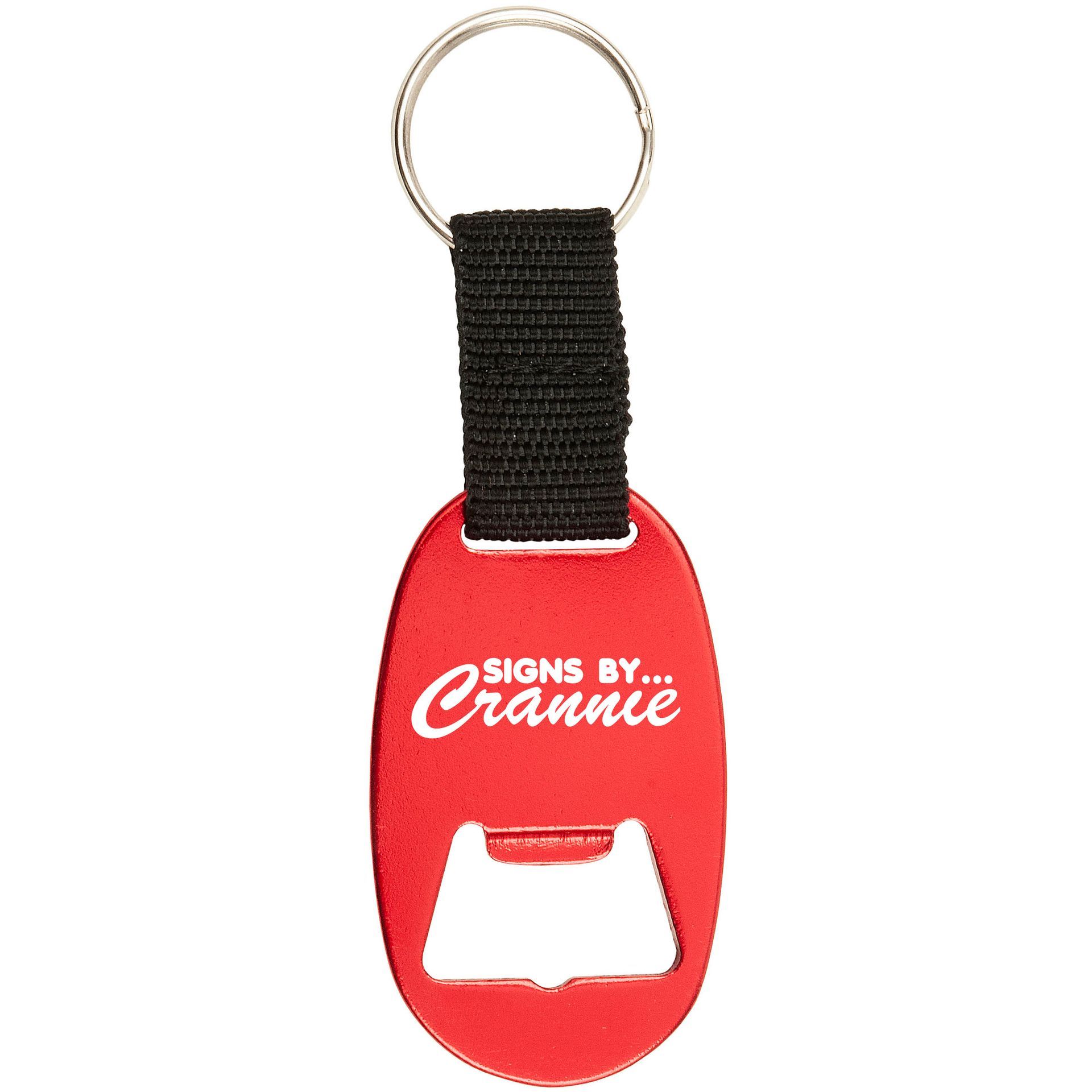 A red keychain with a black strap that says signs by crannie