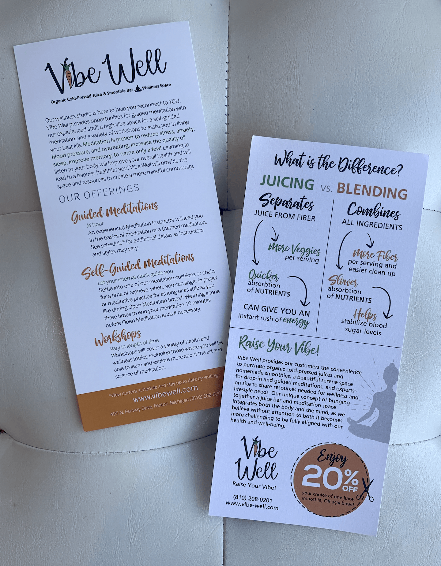 Two pamphlets are sitting next to each other on a table.