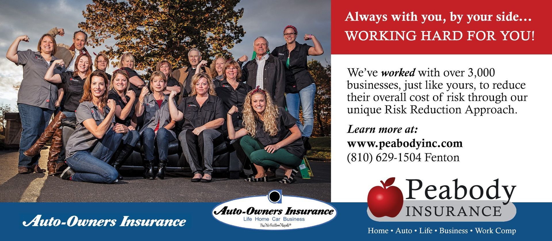 A group of people posing for a picture with peabody insurance in the background