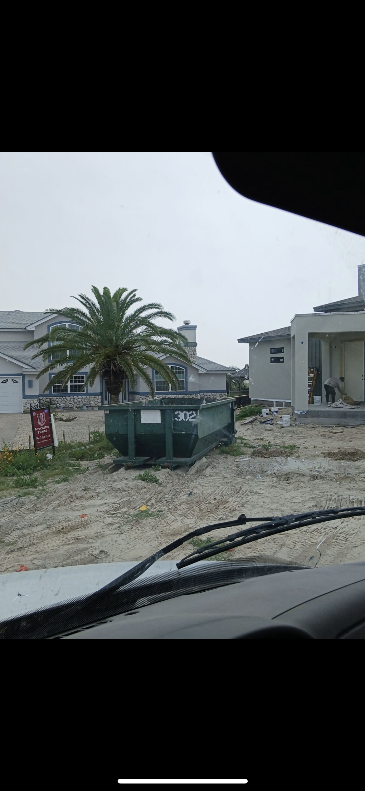 A Dumpster Filled With Junk — Corpus Christi, TX — Dumpsters by Hebert Irrigation