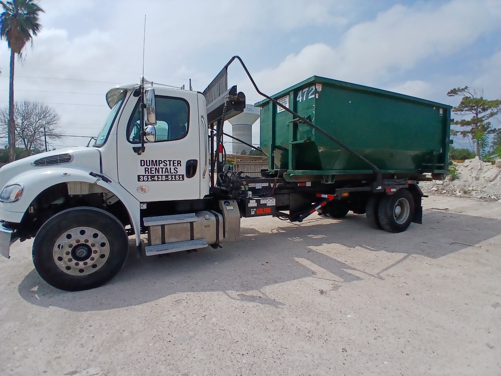 A Row Of Green Dumpsters — Corpus Christi, TX — Dumpsters by Hebert Irrigation