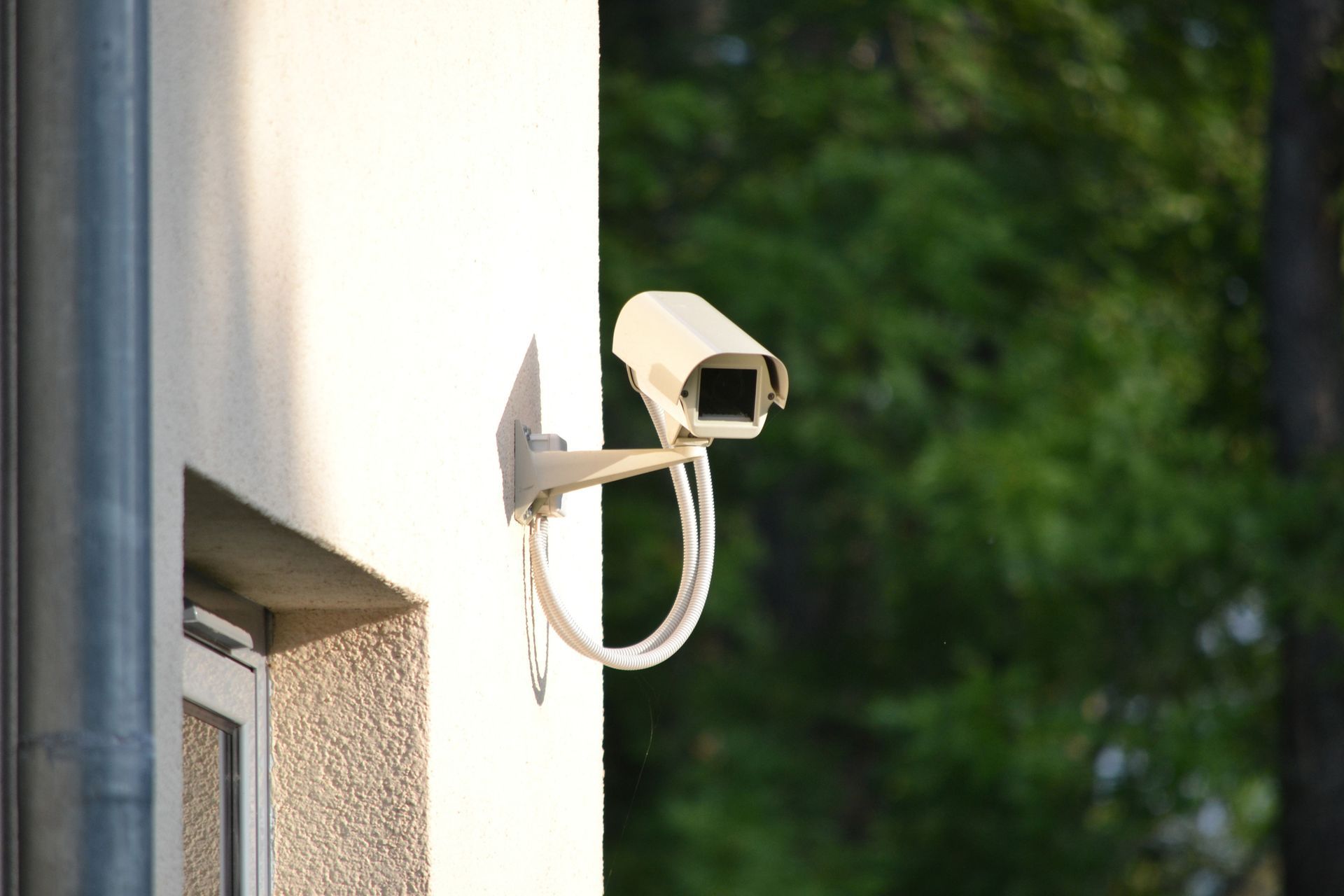 Security camera installed on a wall.