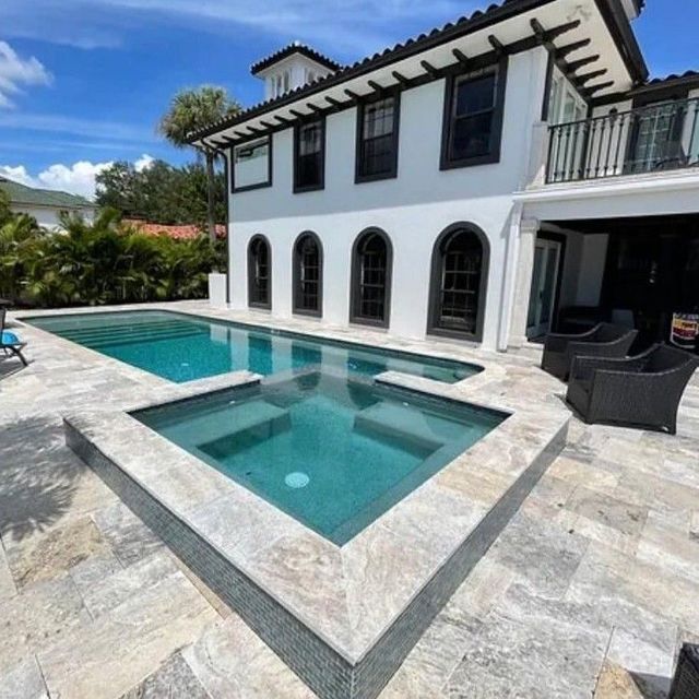 Completed pool and outdoor project by Precision Pavers
