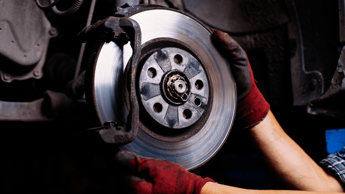 a mechanic doing a brake repair job