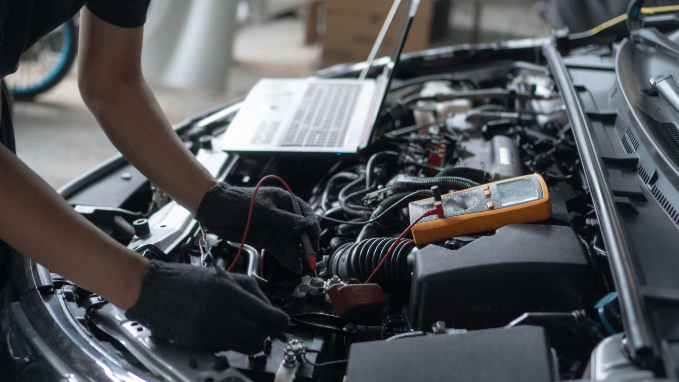 a mechanic doing an engine diagnostic test