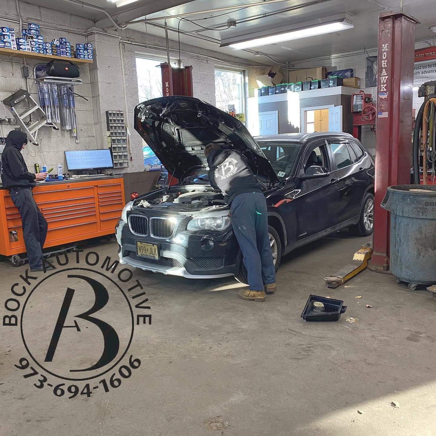 Bock Automotive mechanics working
