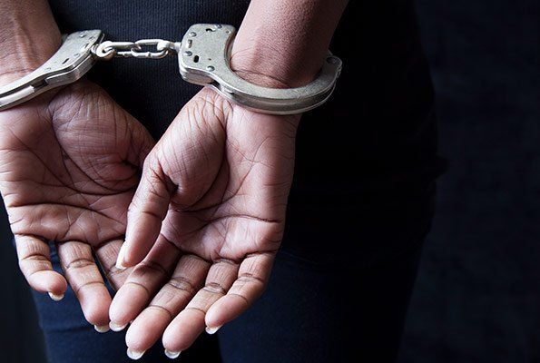 Woman In Handcuffs — St. Minneapolis, MN — Absolute Bail Bonds