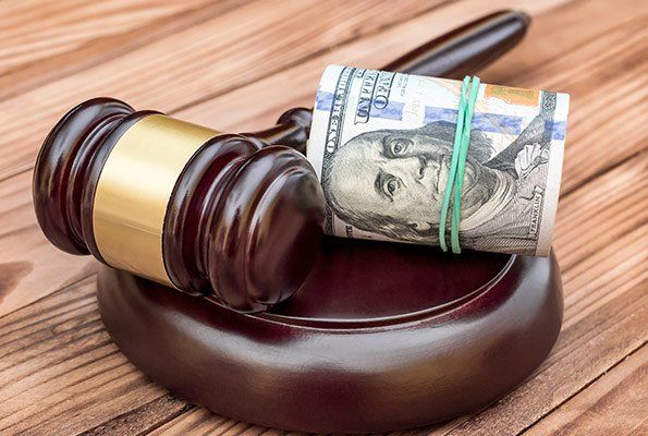 Gavel With Roll Of Cash — St. Minneapolis, MN — Absolute Bail Bonds