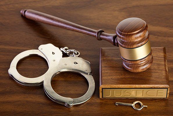 Justice Gavel & Handcuffs — St. Minneapolis, MN — Absolute Bail Bonds