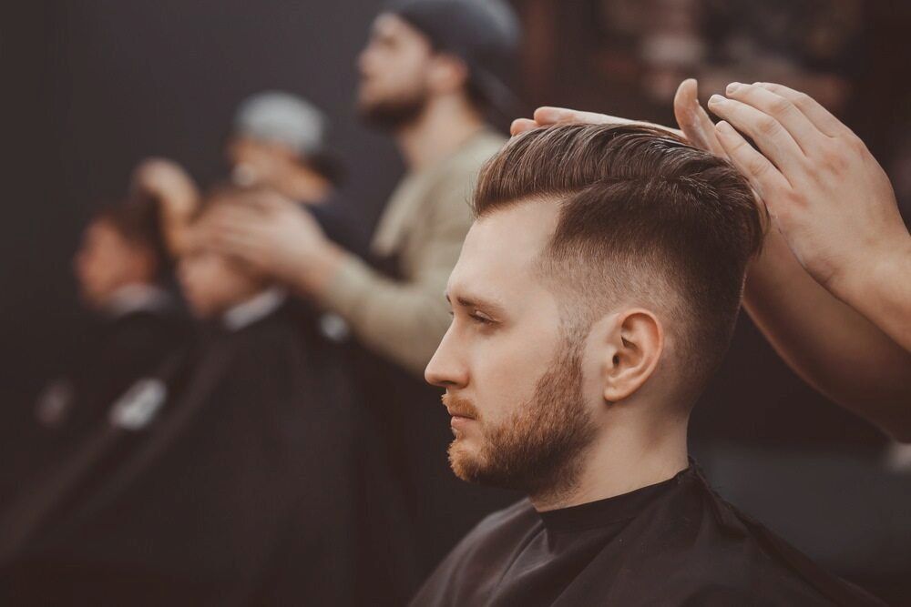 Man Getting a Haircut at a Barbershop — Bermann Barbershop in Nicholls, ACT