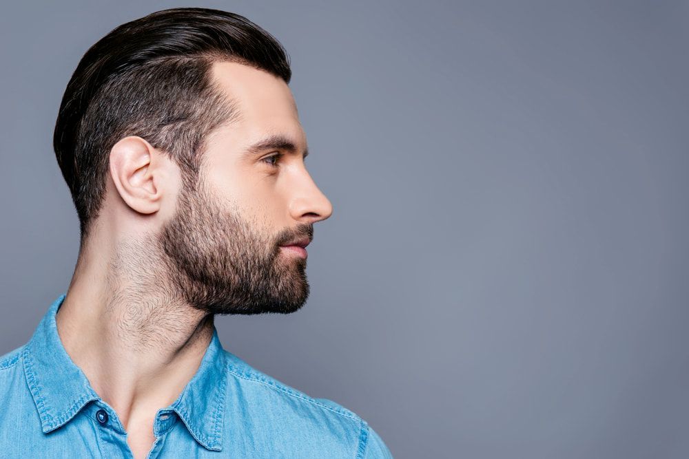 Man With Dark Hair and Beard, Looking Right — Bermann Barbershop in Casey, ACT