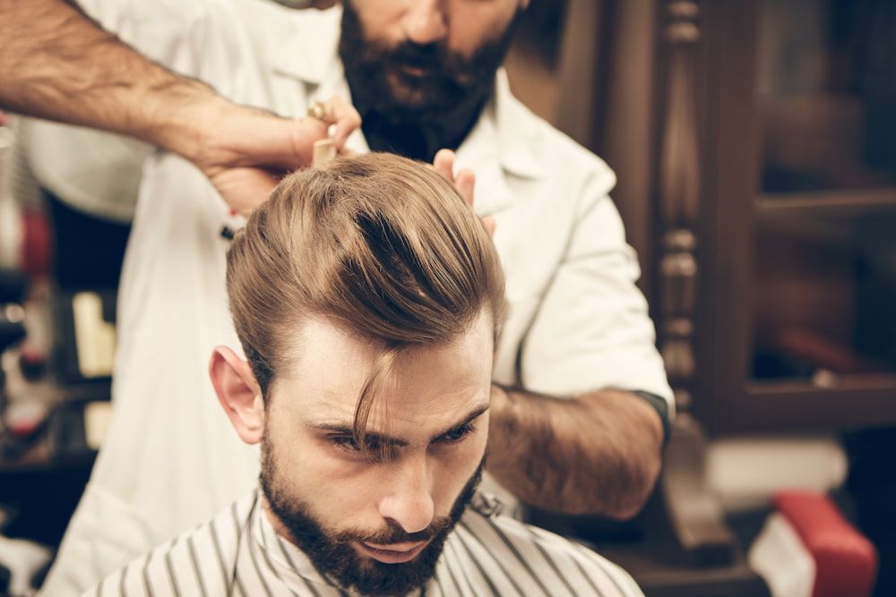 Man Getting a Haircut at a Barber Shop — Bermann Barbershop in Ngunnawal, ACT