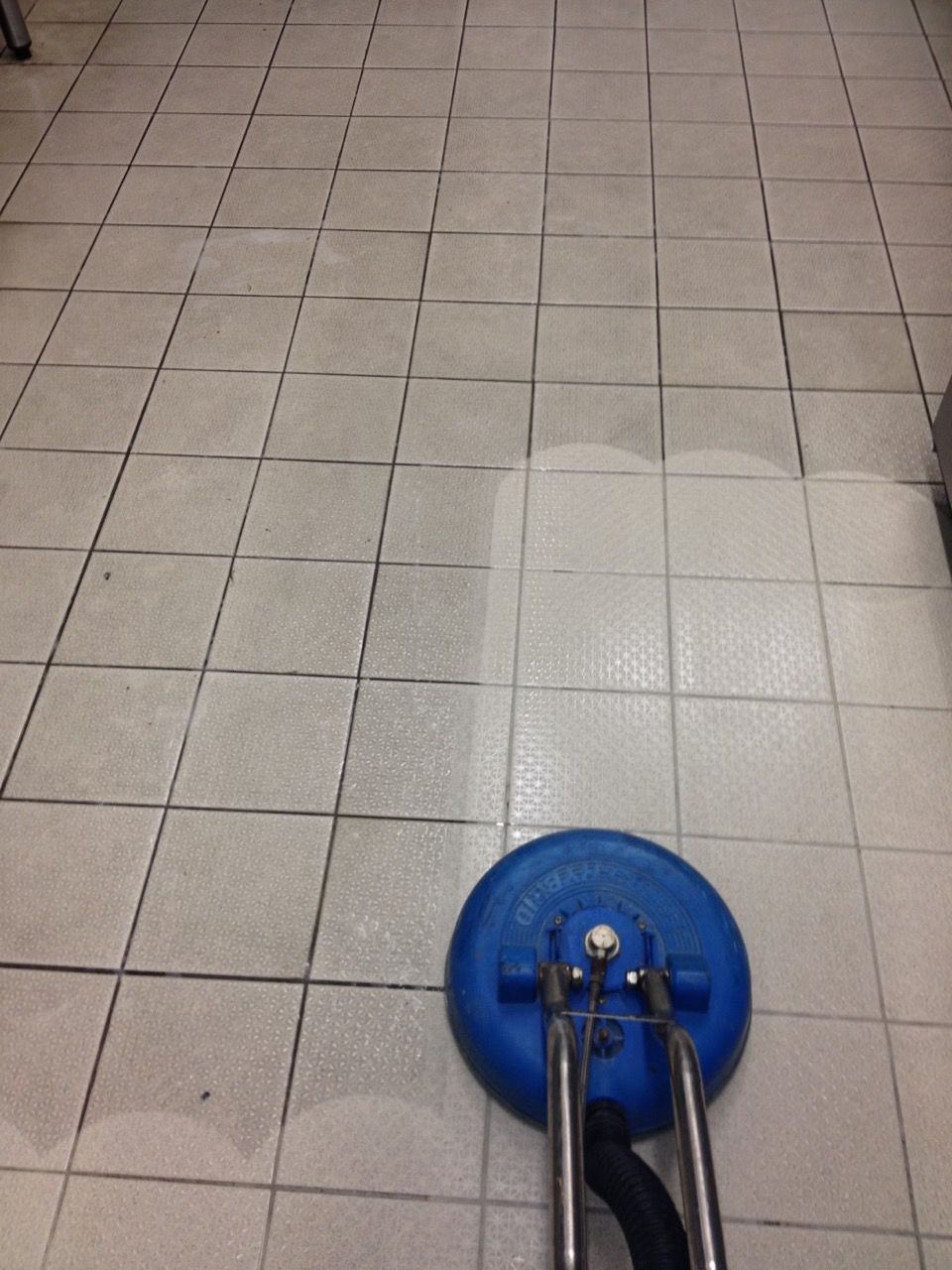 Cleaner Polishing Floor with Buffer — Cleaning Company in Bundaberg