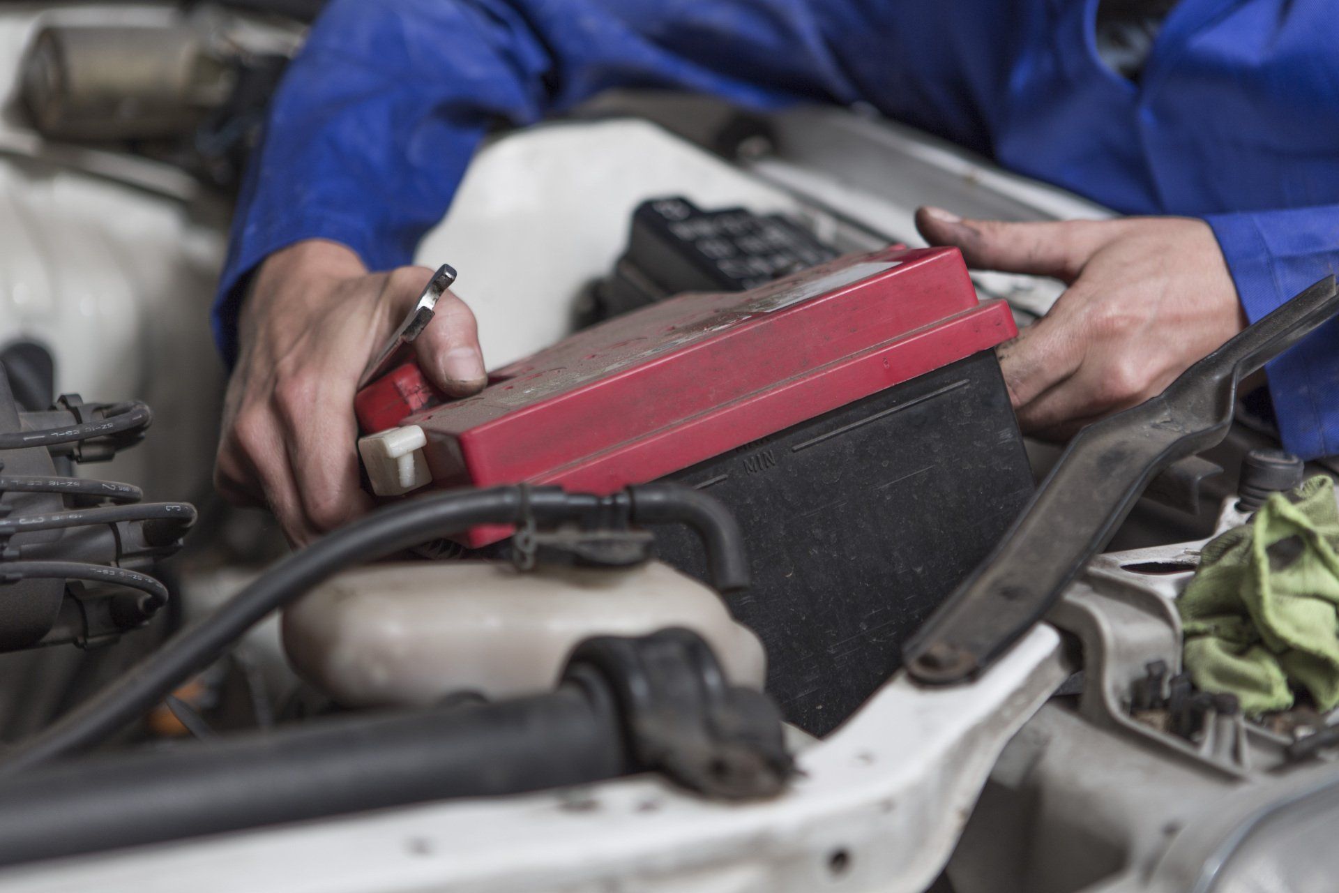 Man Removing Battery - Bakersfield, CA - A1 Battery