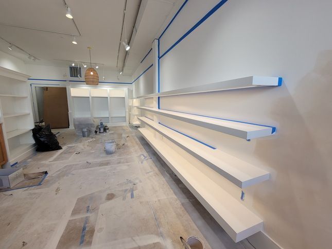 A blurred image of a restaurant with a table in the foreground.